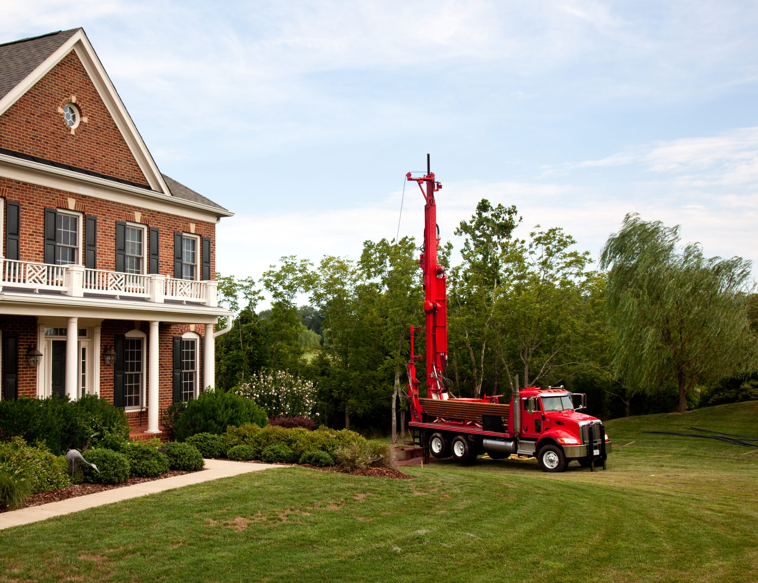 House with drilling rig